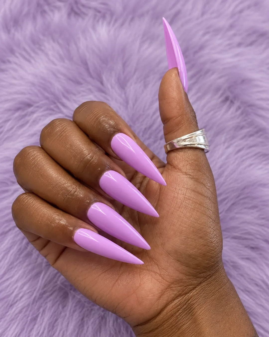 Long lavender stiletto nails