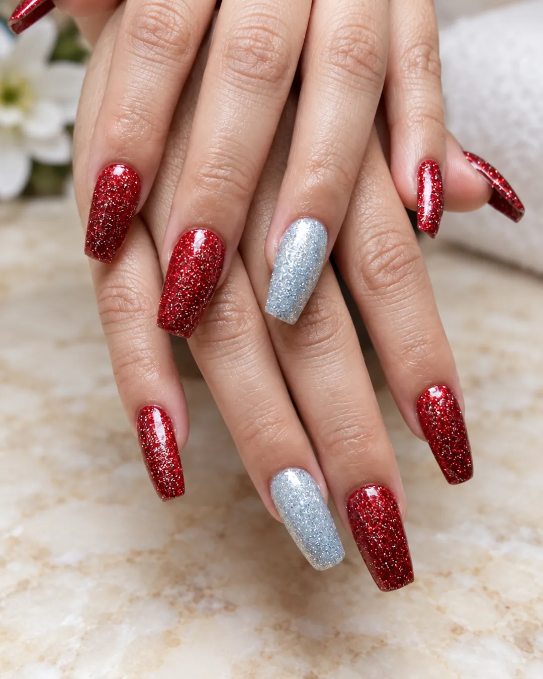 Red glitter coffin nails with a silver glitter accent nail